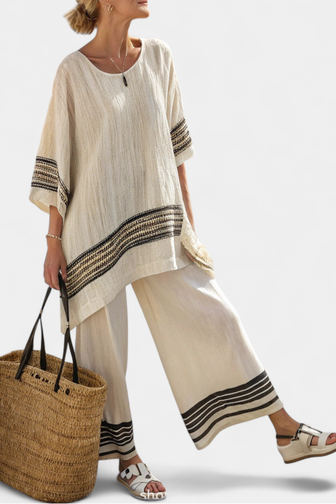 Mariella – elegant black striped top and fluid pants