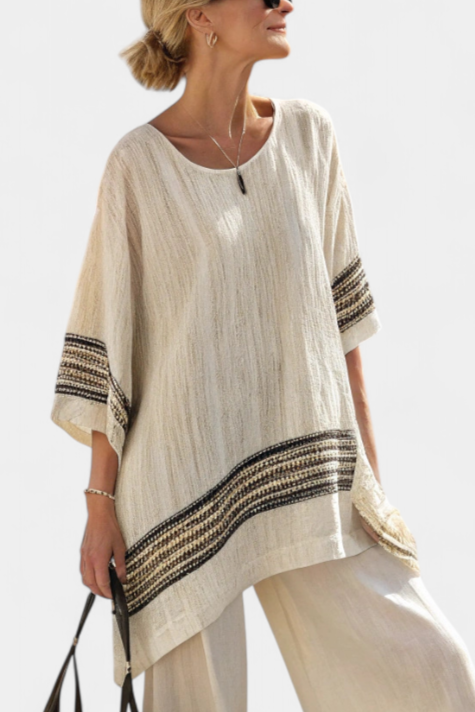 Mariella – elegant black striped top and fluid pants