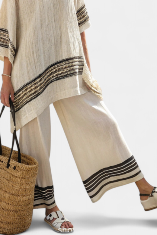Mariella – elegant black striped top and fluid pants