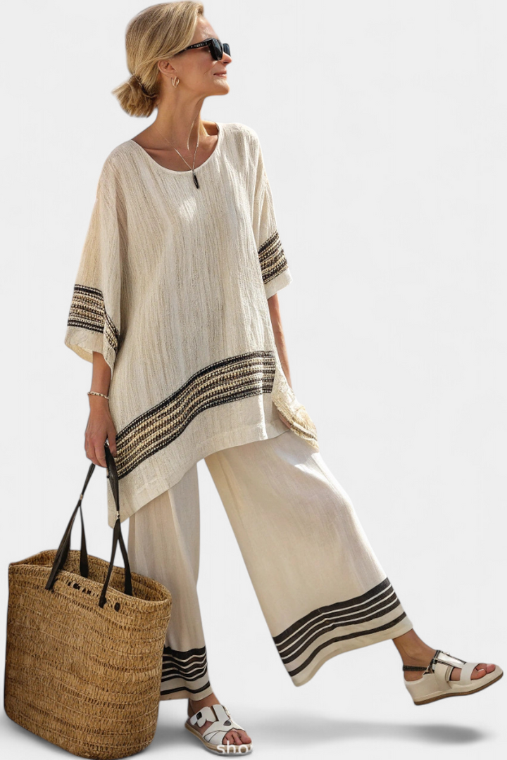 Mariella – elegant black striped top and fluid pants