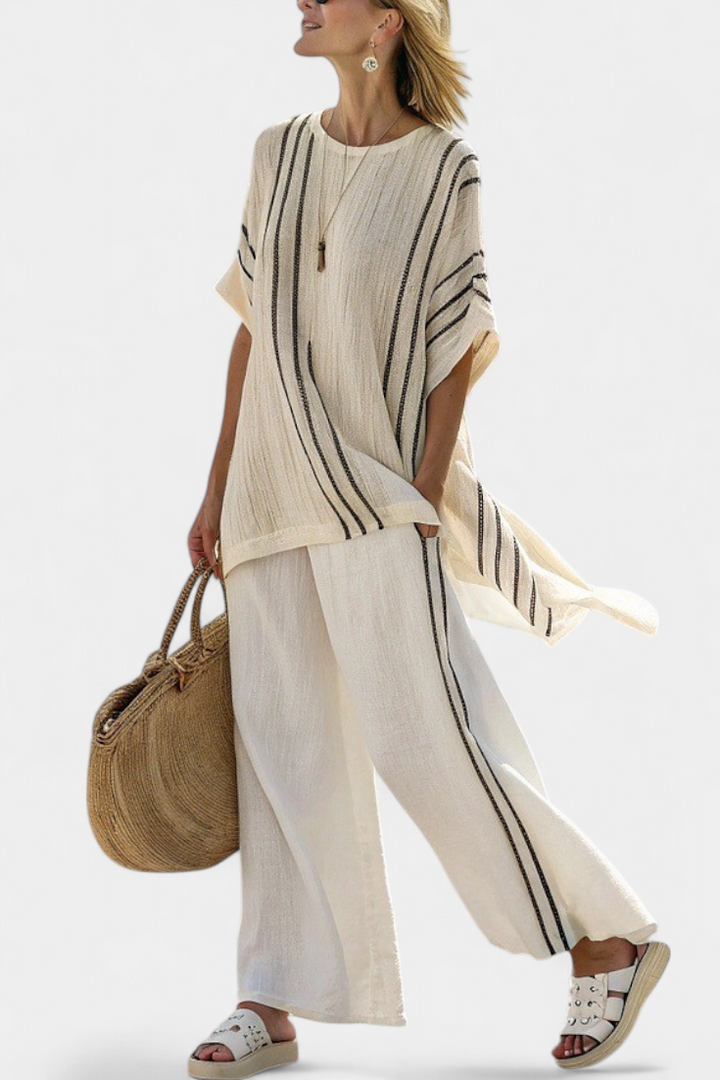 Raffaella – elegant ivory blouse and black striped pants